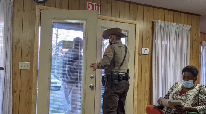 Former Mayor escorted out of Colony Town Council meeting after argument over food distribution