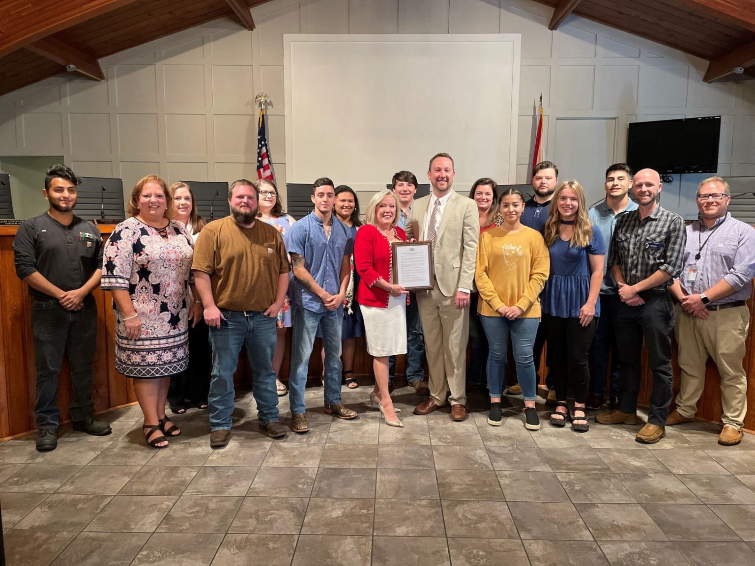 Oneonta Mayor Richard Phillips signs proclamation, recognizing Wallace