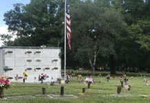 Flags placed at Cullman Memory Gardens by Cullman VFW members