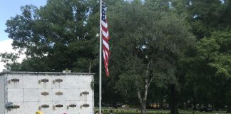 Flags placed at Cullman Memory Gardens by Cullman VFW members