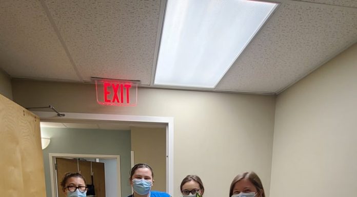 Cullman Florist visits essential workers for Make Someone Smile Week