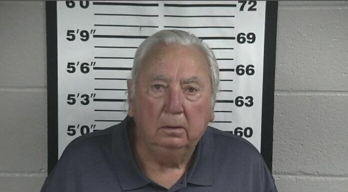 Former mayor faces five criminal charges