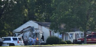 Tractor-trailer rig strikes house in Berlin
