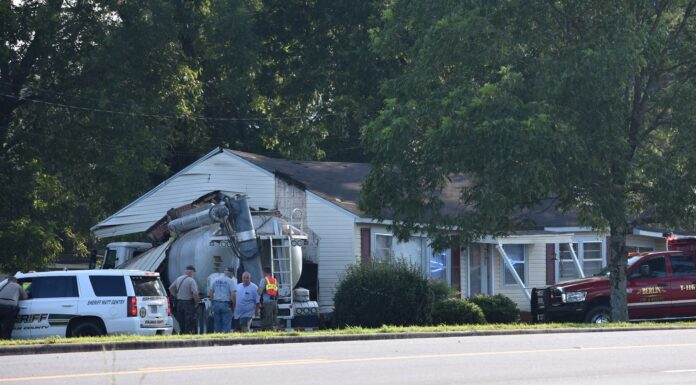 Tractor-trailer rig strikes house in Berlin