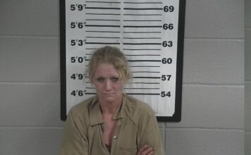 Woman walking along roadway arrested on drug charges