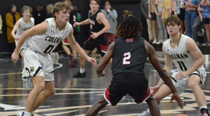 PREP BASKETBALL: Bearcats blow past Trojans in area opener 72-43, Lady Bearcats fall to Muscle Shoals 71-53