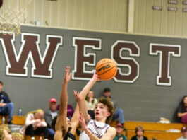 PREP BASKETBALL: Wheeler’s late free throws lift Warriors over Tigers 66-64, Lady Warriors handle Russellville 62-34