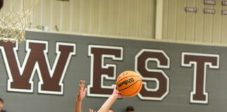 PREP BASKETBALL: Wheeler’s late free throws lift Warriors over Tigers 66-64, Lady Warriors handle Russellville 62-34