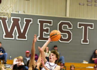 PREP BASKETBALL: Wheeler’s late free throws lift Warriors over Tigers 66-64, Lady Warriors handle Russellville 62-34