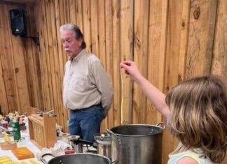 President of the Cullman Beekeeping Association teaches candle making class at the Agriplex
