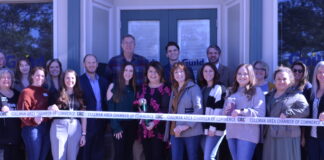 Guild Mortgage cuts ribbon on new Cullman office