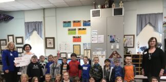 Hanceville teacher receives $200 for winning AEA’s Be A Champion and Read Decorating Contest