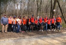 Wallace State volunteers clean up illegal dump site in garden city