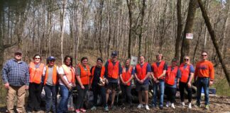 Wallace State volunteers clean up illegal dump site in garden city