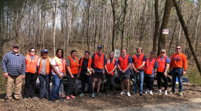 Wallace State volunteers clean up illegal dump site in garden city