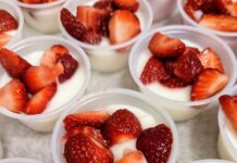 West Elementary students celebrate healthy eating with strawberries provided by Farm to Table