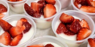 West Elementary students celebrate healthy eating with strawberries provided by Farm to Table