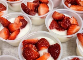 West Elementary students celebrate healthy eating with strawberries provided by Farm to Table