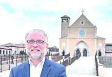 Shrine hires lay director of administration