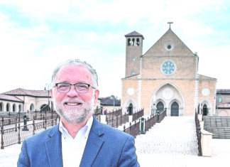 Shrine hires lay director of administration