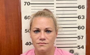 Dog attacks police officer; Hanceville woman arrested