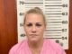 Dog attacks police officer; Hanceville woman arrested