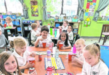 1st graders at Sacred Heart School make ‘Coke Floats’