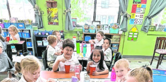 1st graders at Sacred Heart School make ‘Coke Floats’