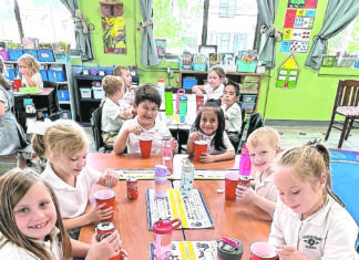 1st graders at Sacred Heart School make ‘Coke Floats’
