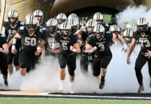 PREP FOOTBALL: Cullman races past Athens on the road for 35-23 region win