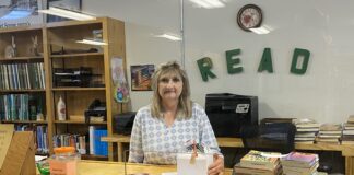 Meet Melody Camp, Holly Pond’s dutiful librarian