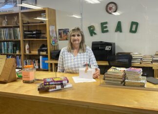 Meet Melody Camp, Holly Pond’s dutiful librarian