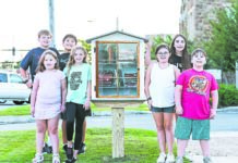 Church tweens open free library for area children
