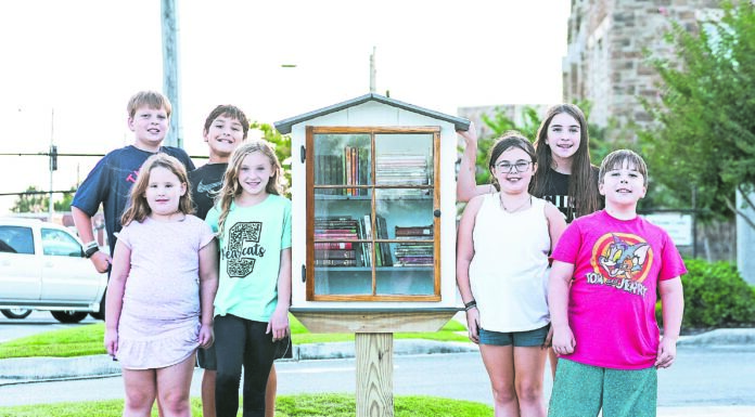 Church tweens open free library for area children