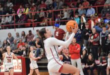 PREP BASKETBALL: Raiders, Lady Raiders take home openers over Decatur Heritage