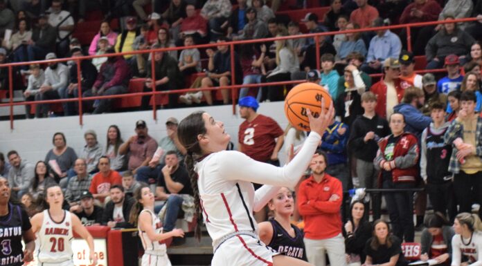PREP BASKETBALL: Raiders, Lady Raiders take home openers over Decatur Heritage