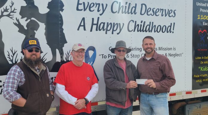 Local heritage group donates to Cullman Caring for Kids