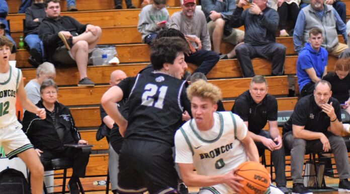 PREP BASKETBALL: No. 2 Holly Pond handles No. 3 Decatur Heritage 63-26, Lady Broncos fall 42-27