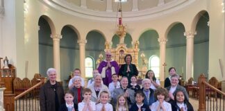 Sacred Heart students meet pen pals at 1st confession