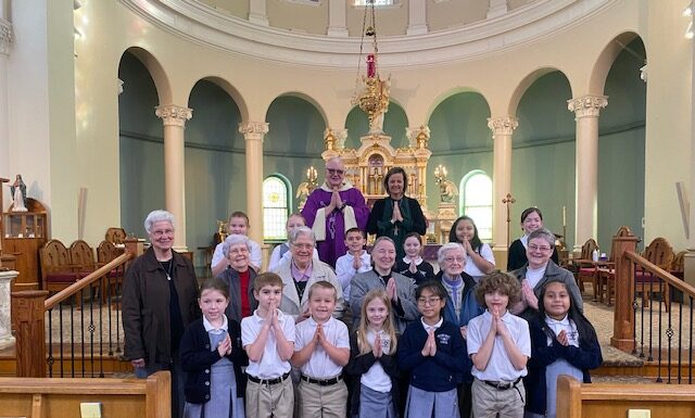 Sacred Heart students meet pen pals at 1st confession