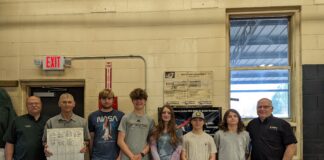 CATA students machine parts for International Space Station