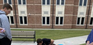 CHS seniors celebrate college picks with sidewalk art