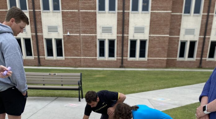 CHS seniors celebrate college picks with sidewalk art