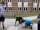 CHS seniors celebrate college picks with sidewalk art