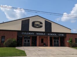 CPD address report of gun at CMS dance