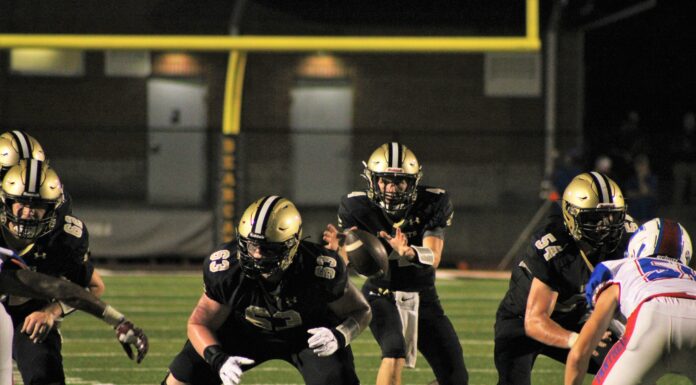 PREP FOOTBALL: Bearcats drop season opener to Mars Hill 55-21