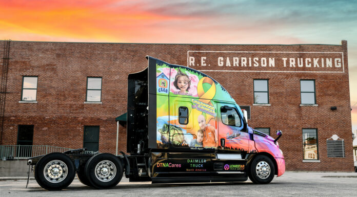 RE Garrison Trucking showcases cancer awareness wraps on fleet