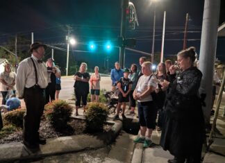 Participants enjoy 14th annual Candlelight Walking Tour