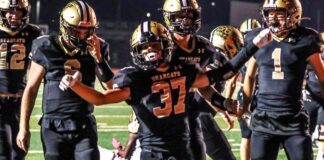 PREP FOOTBALL: Bearcats dominate Columbia 49-0