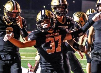 PREP FOOTBALL: Bearcats dominate Columbia 49-0